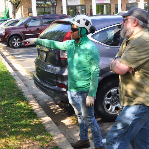A-AAA-Website-inventory-client-facing A member of the A-AAA Tree Service team talking to a client about a tree inventory in the Greater Baltimore Area.