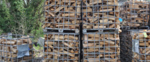 Organized cages of seasoned firewood ready for local delivery to Baltimore County homes by Ridgeback Firewood.