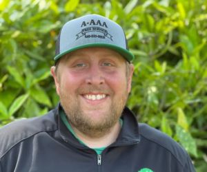 A headshot of Licensed Tree Expert, Estimator, and Foreman, Zach Riley.